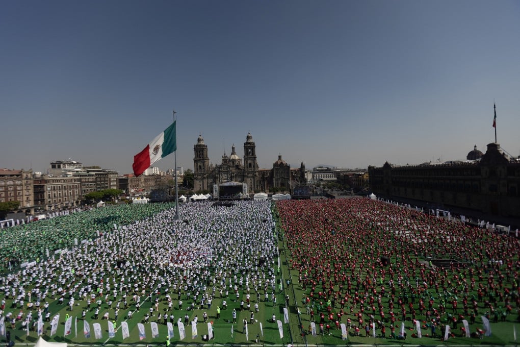 Mexico attempts to set a new Guinness World Record for the world’s largest football lesson as part of efforts to promote the country ahead of the 2026 Fifa World Cup. Photo: Reuters