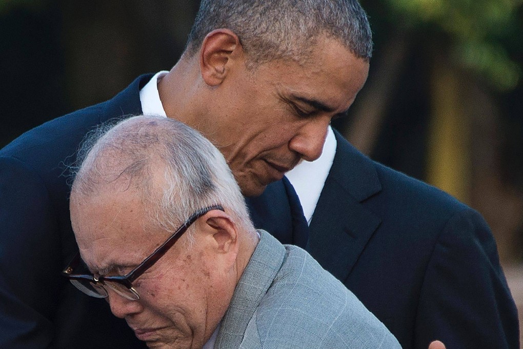 Then US president Barack Obama hugs Shigeaki Mori, a survivor of the 1945 atomic bombing of Hiroshima, during a visit to the Hiroshima Peace Memorial Park in 2016. Photo: AFP