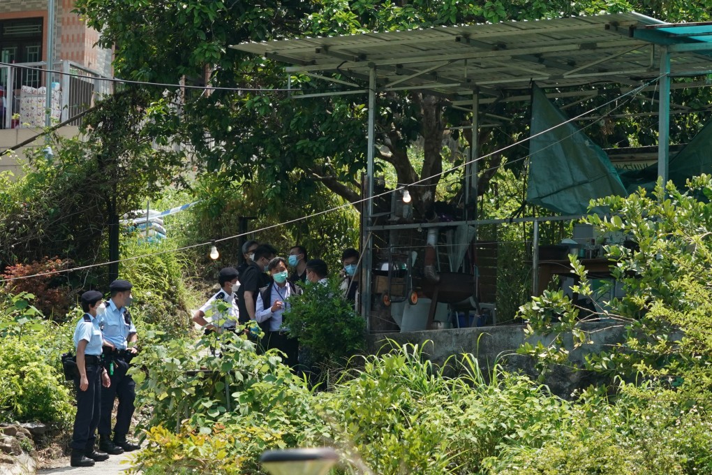 The woman’s body was found face down near the main entrance of the house in Mui Tsz Lam village. Photo: Felix Wong