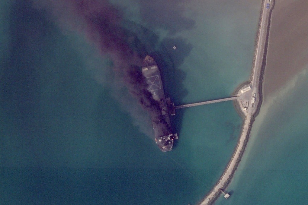 A burning ship after a US military attack on a port in Bandar Abbas, Iran on March 2. Photo: Planet Labs PBC via AP