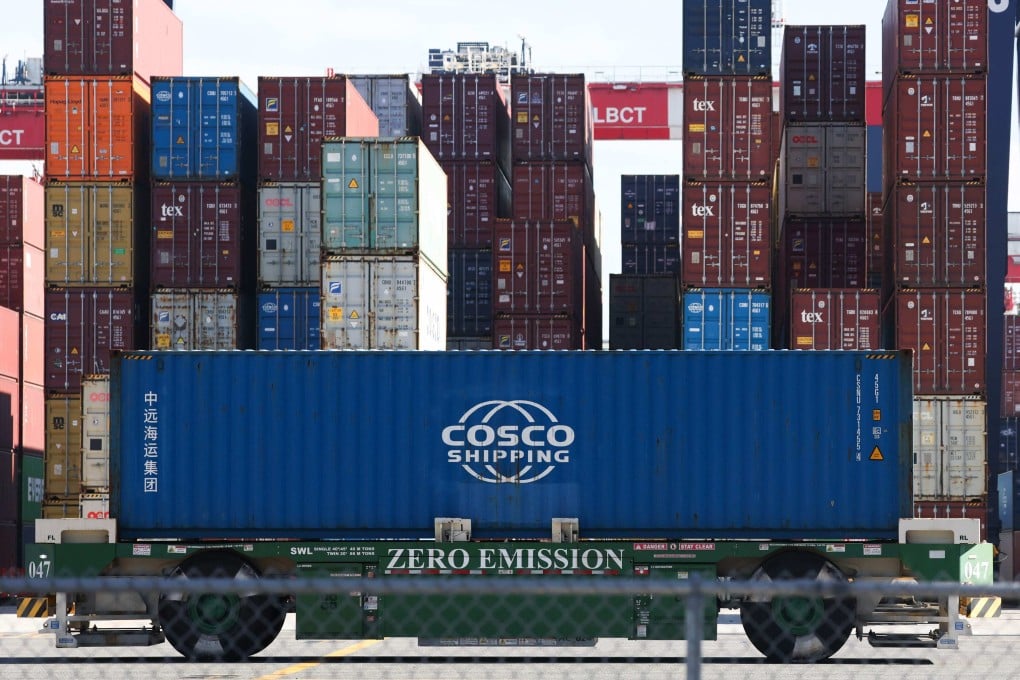 An automated container handler moves a Cosco shipping container at the Long Beach Container Terminal at the Port of Long Beach in California on January 14, 2026. Photo: AFP