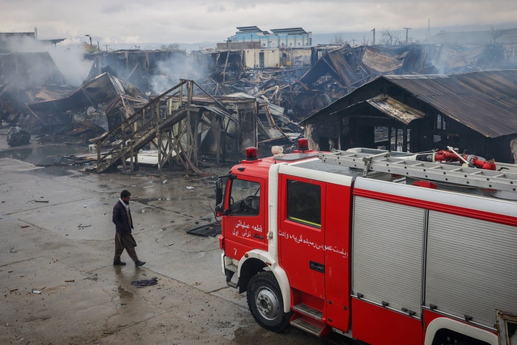 An Afghan man walks next to the site where a drug rehabilitation centre was destroyed in an air strike in Kabul on Wednesday. Photo: Reuters