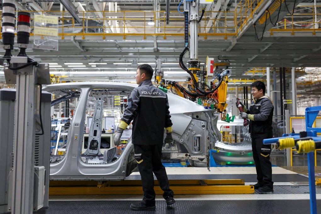 Employees work on an electric vehicle (EV) production line at the Volkswagen Anhui factory in Hefei, Anhui province, China, as the Iran war pushes up petrol prices and global EV uptake is expected to accelerate. Photo: Reuters