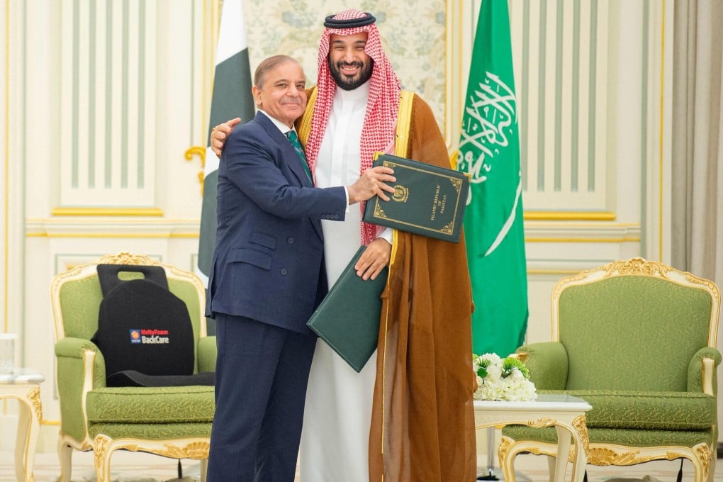 Saudi Crown Prince Mohammed bin Salman and Pakistan Prime Minister Shehbaz Sharif hug after signing a defence pact, in Riyadh, Saudi Arabia, on September 17, 2025. Photo: Reuters