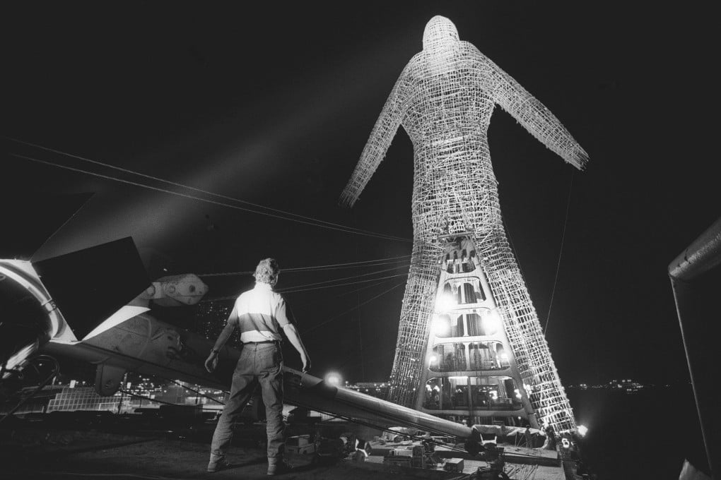The Bamboo Man sculpture by multimedia artist André Heller is lit up in readiness for its journey across Victoria Harbour in May 1992. Photo: SCMP Archives