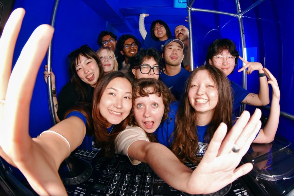Members of the Moth team pose for a photo in the DJ booth at the foundation’s new Sai Ying Pun space, which offers DJ courses and is a vibrant hub for Hong Kong’s LGBTQ community. Photo: Moth Foundation