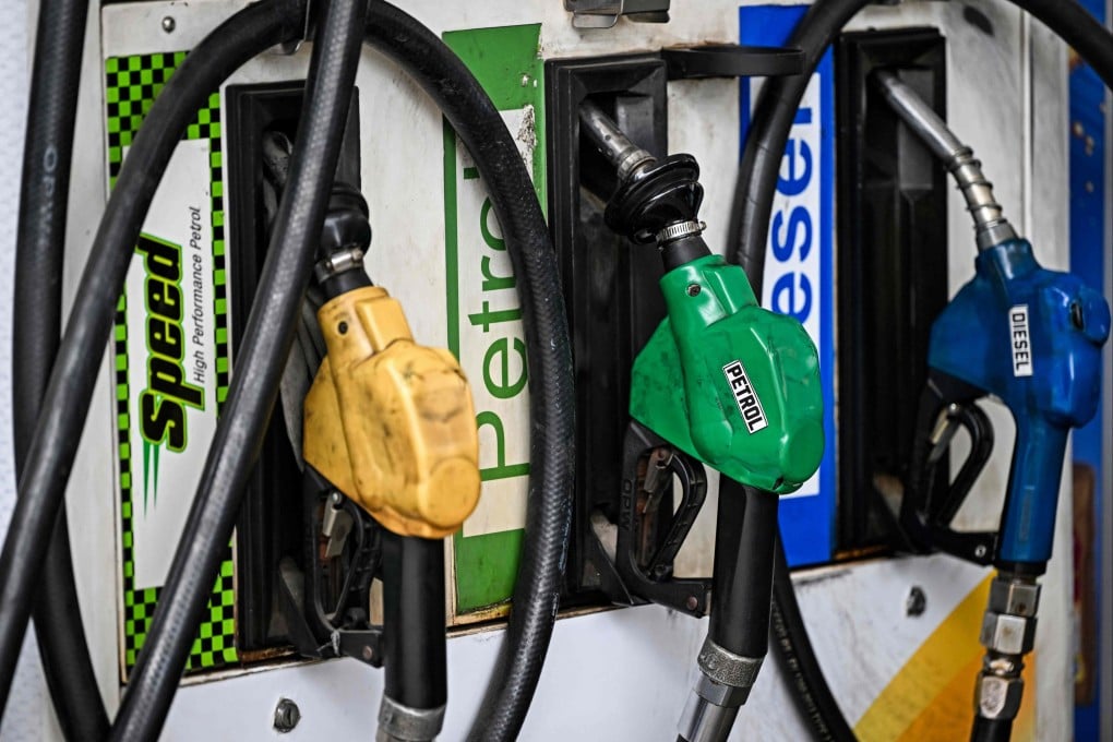 Fuel nozzles at a Bharat Petroleum gas station in New Delhi. Photo: AFP