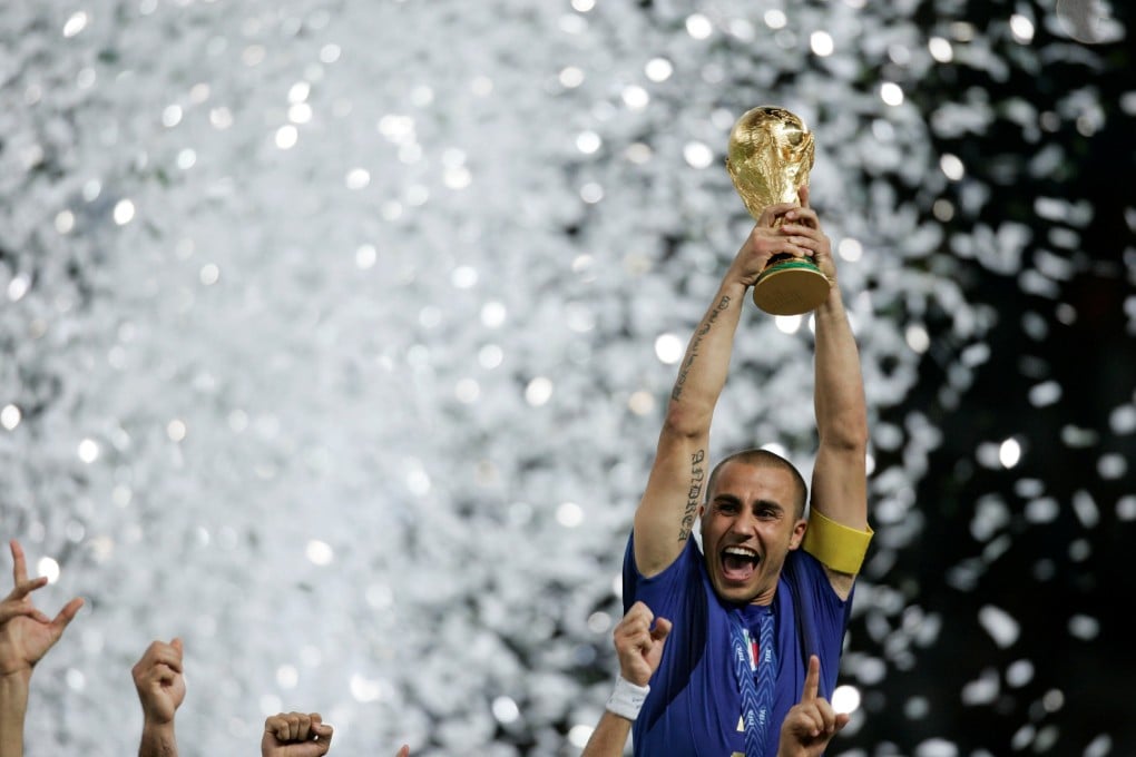 Captain Fabio Cannavaro holds up the World Cup trophy after Italy beat France to win the 2006 final at the Olympic Stadium in Berlin, their fourth and last world title. Photo: Reuters