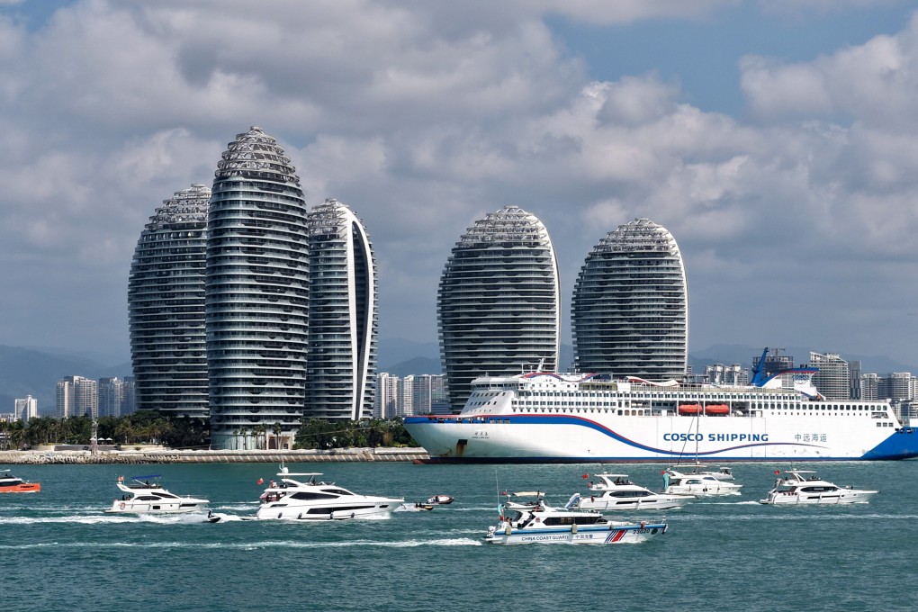 A drone photo taken on February 21 shows tourists taking yachts in Sanya, south China’s Hainan province. Photo: Xinhua