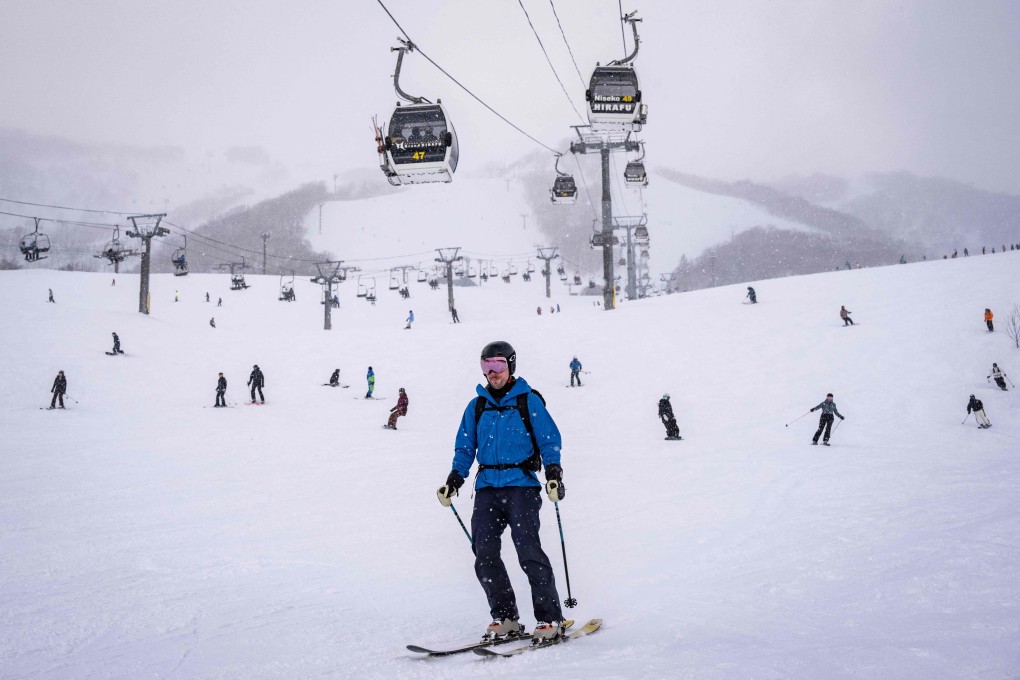 Foreign tourists skiing and snowboarding at the Niseko Tokyu Grand Hirafu ski resort in Kutchan, Japan’s Hokkaido prefecture. Photo: AFP