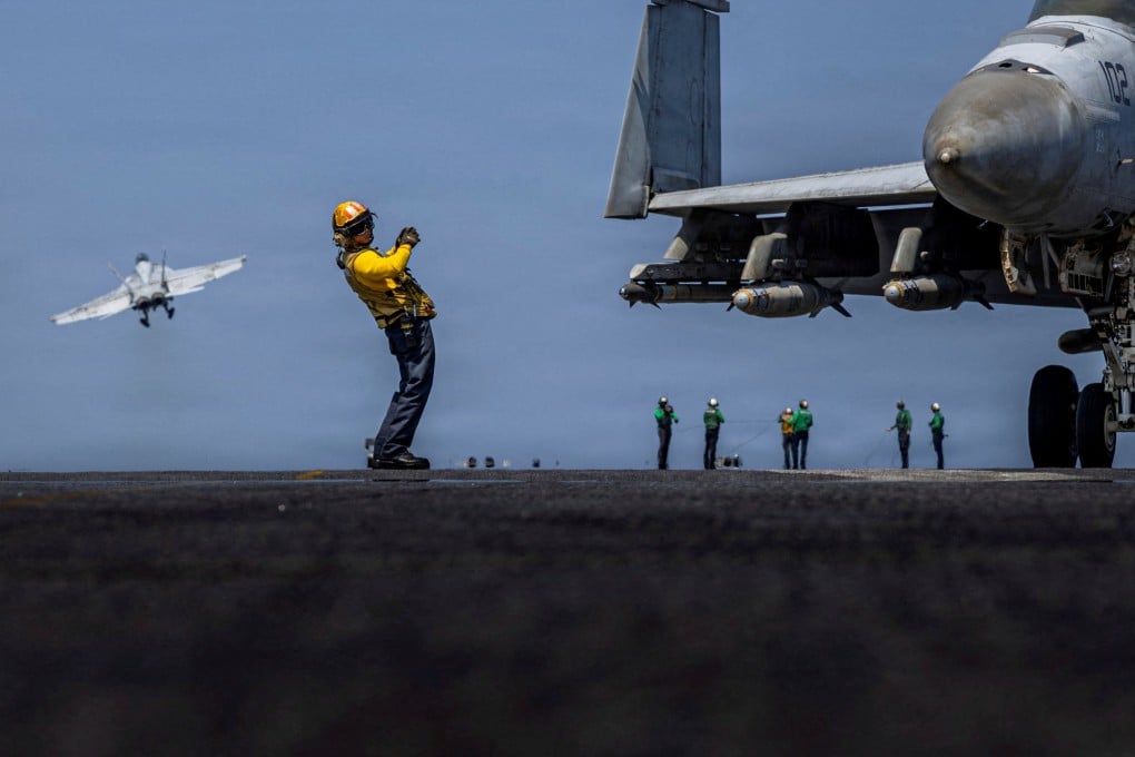 An F/A-18F Super Hornet launches from the flight deck of the USS Abraham Lincoln from an undisclosed location on March 6. Photo: US Navy via Reuters