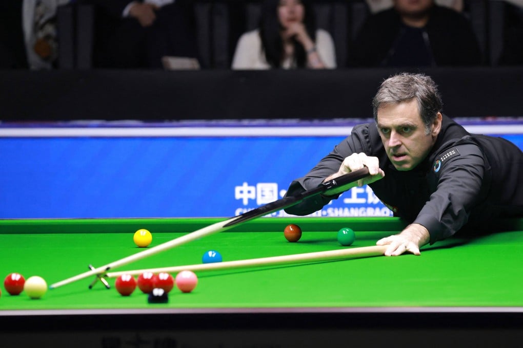 Britain’s Ronnie O’Sullivan plays a shot during Frame 1 of his match against Ryan Day of Wales at the Snooker World Open in Yushan on Friday. Photo: AFP