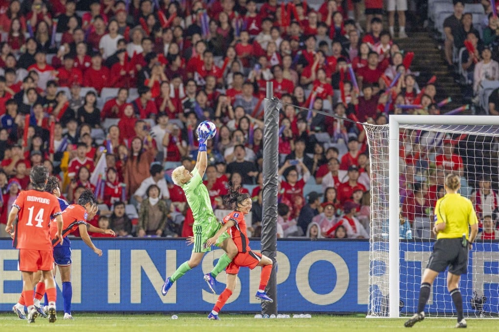 Japan goalkeeper Yamashita Akaya claims the ball against South Korea in the second semi-final of the Women’s Asian Cup, a match played before the largest crowd involving two non-hosting nations. Photo: Xinhua