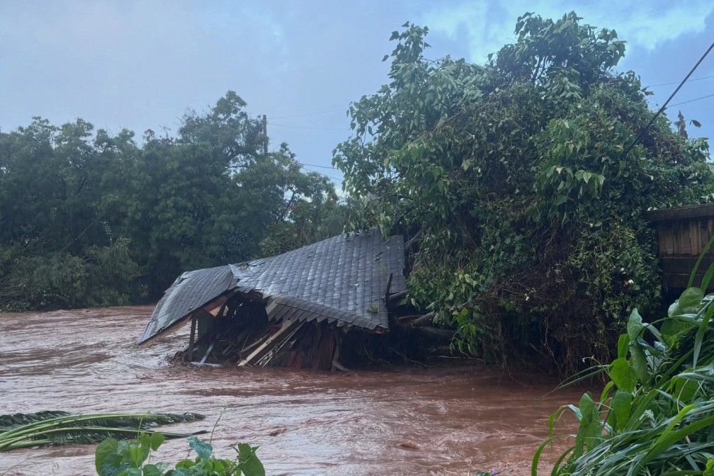 The remains of a house against a bridge in Hawaii’s northern Oahu. Photo: Handout via AFP