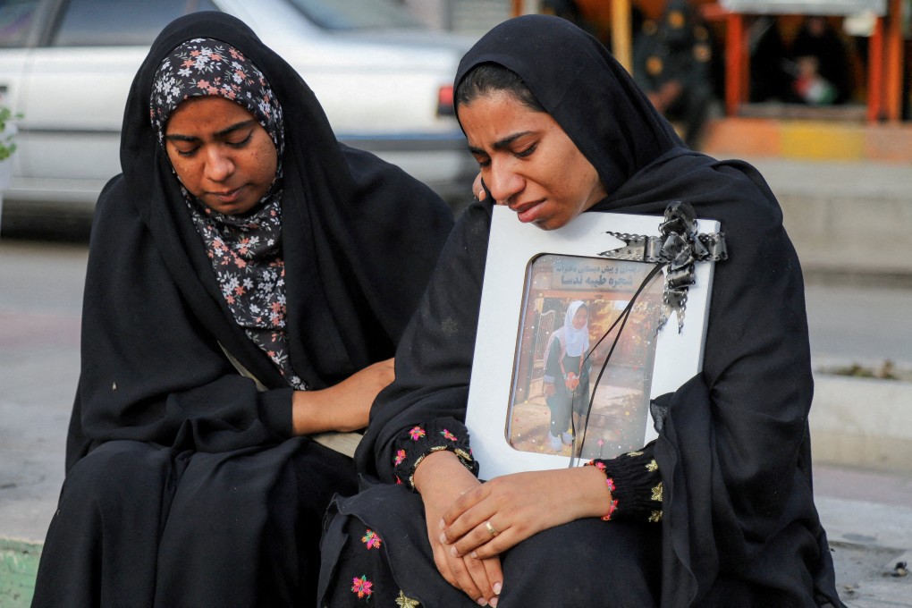 Photos of grieving families in Iran have attracted millions of views on Chinese social media. Photo: Reuters