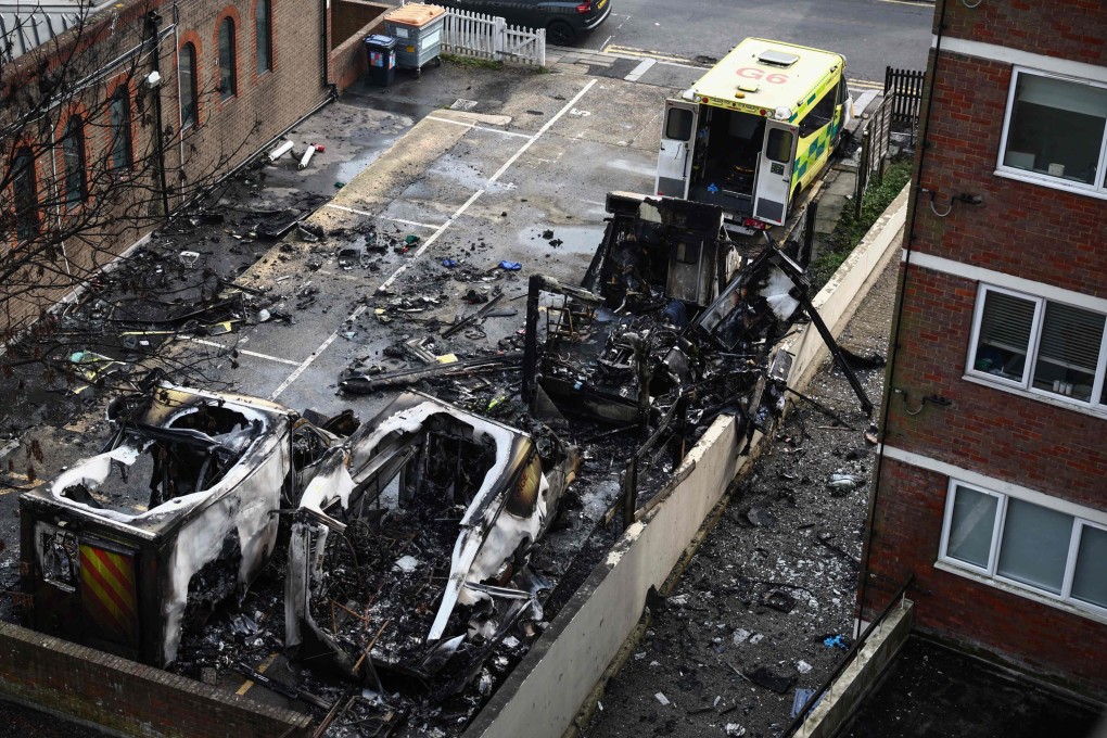 Burnt ambulances, run by a Jewish non-profit organisation, are pictured in a street in London on Monday after an arson attack. Photo: AFP