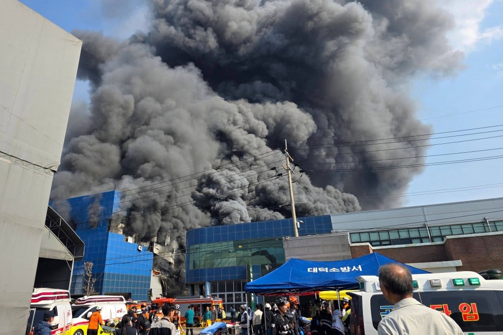 Heavy smoke billows from the blaze at a car parts factory in Daejeon, South Korea, on Friday. Photo: Yonhap/AFP