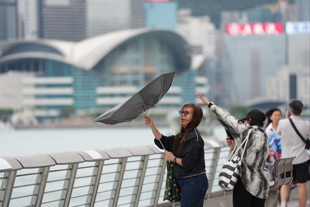 People at the Avenue of Stars in Tsim Sha Tsui during a typhoon signal No 3. Photo: Jelly Tse
