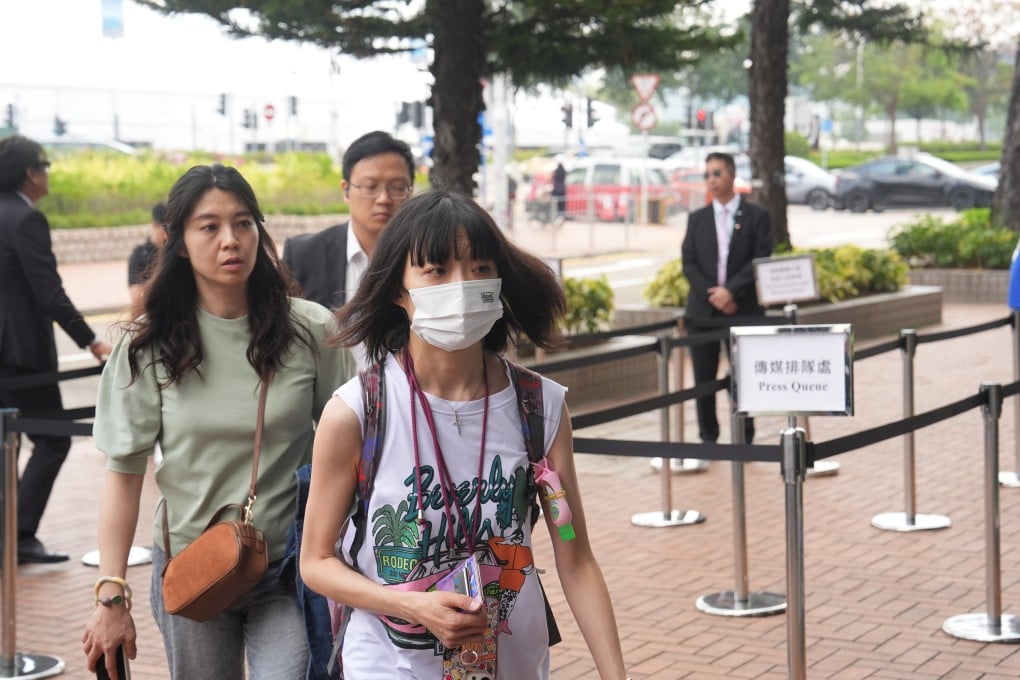 Wang Fuk Court’s Ko Yee-lui (front) arrives with other residents at City Gallery in Central for the third day of the public hearing on Tuesday. Photo: Elson Li