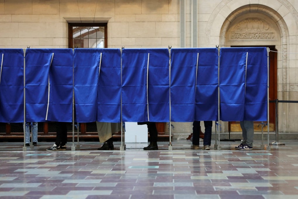 People vote in Copenhagen, Denmark on Tuesday. Photo: Reuters