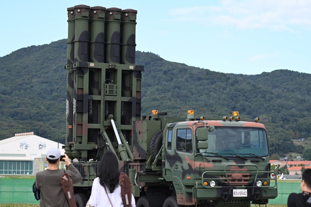 Visitors look at the KM-SAM Cheongung missile system during the Seoul International Aerospace and Defence Exhibition in October last year. Photo: AFP