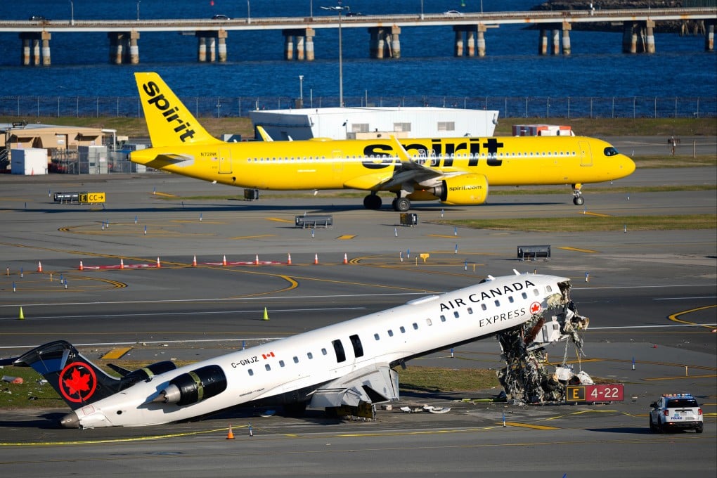 The Air Canada Express jet on the side of the runway at New York’s LaGuardia Airport. Photo: AP