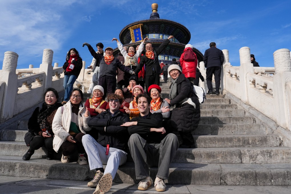 Tourists pose for photos at the Tiantan (Temple of Heaven) Park in Beijing. Photo: Xinhua