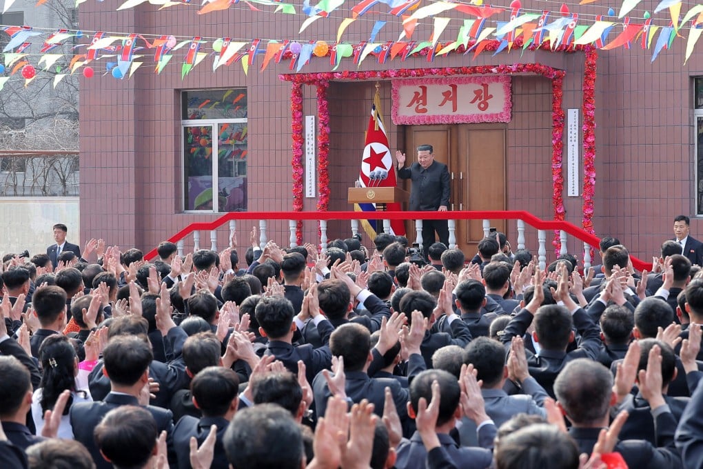 North Korean leader Kim Jong-un greets people during a visit to a coal mine run by young workers on March 15. Photo: KCNA via Reuters
