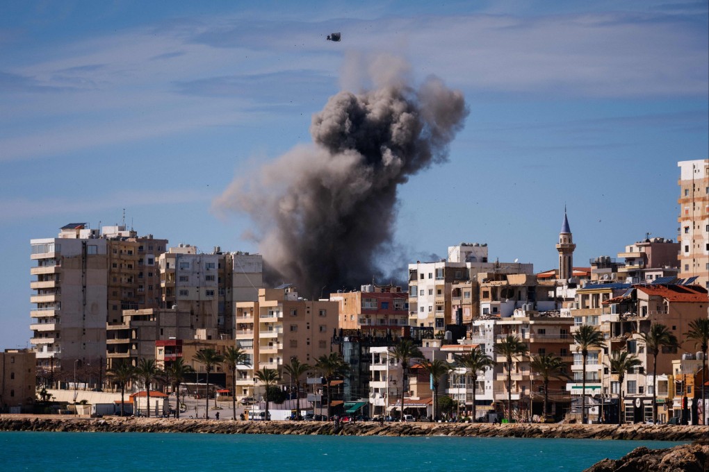 A plume of smoke rises from the site of an Israeli strike on the eastern outskirts of Tyre, in southern Lebanon on Tuesday. Photo: AFP