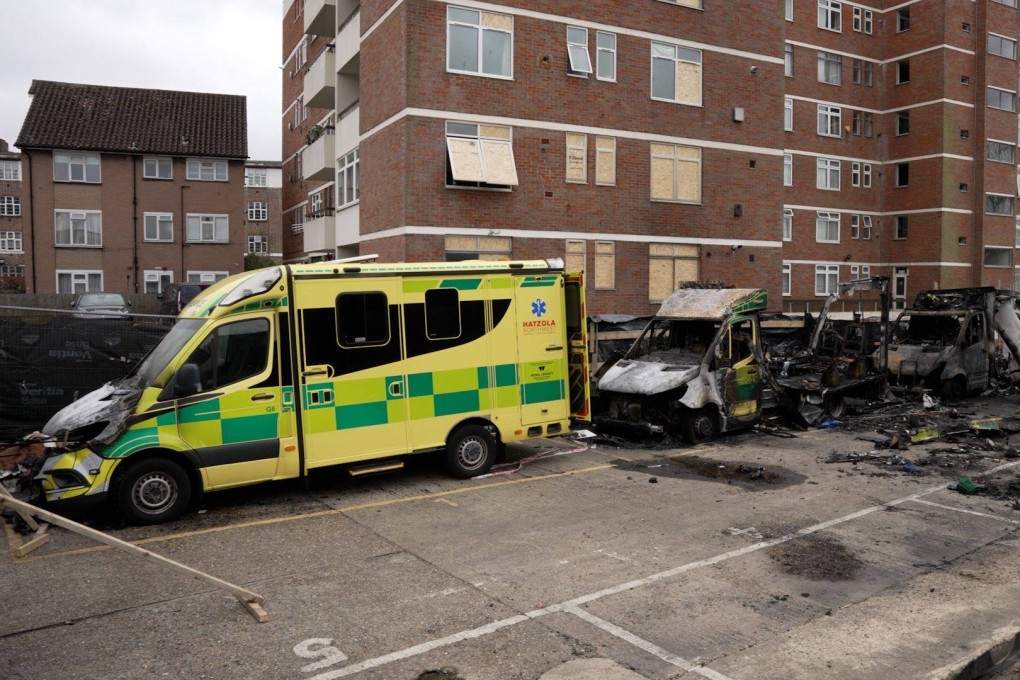 The burnt out remains of Hatzola ambulances at the Jewish Community Ambulance service in Golders Green, after an apparent arson attack on four ambulances on Monday. Photo: dpa