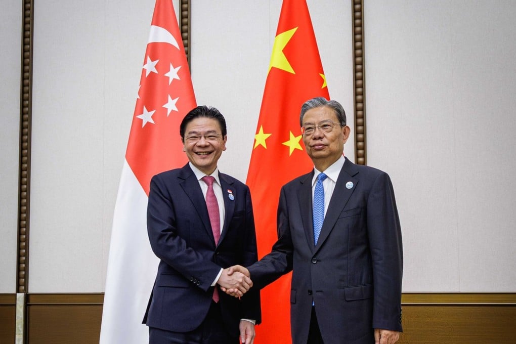 Singaporean Prime Minister Lawrence Wong meets with National People’s Congress chairman Zhao Leji at the Boao Forum for Asia on Thursday. Photo: Handout