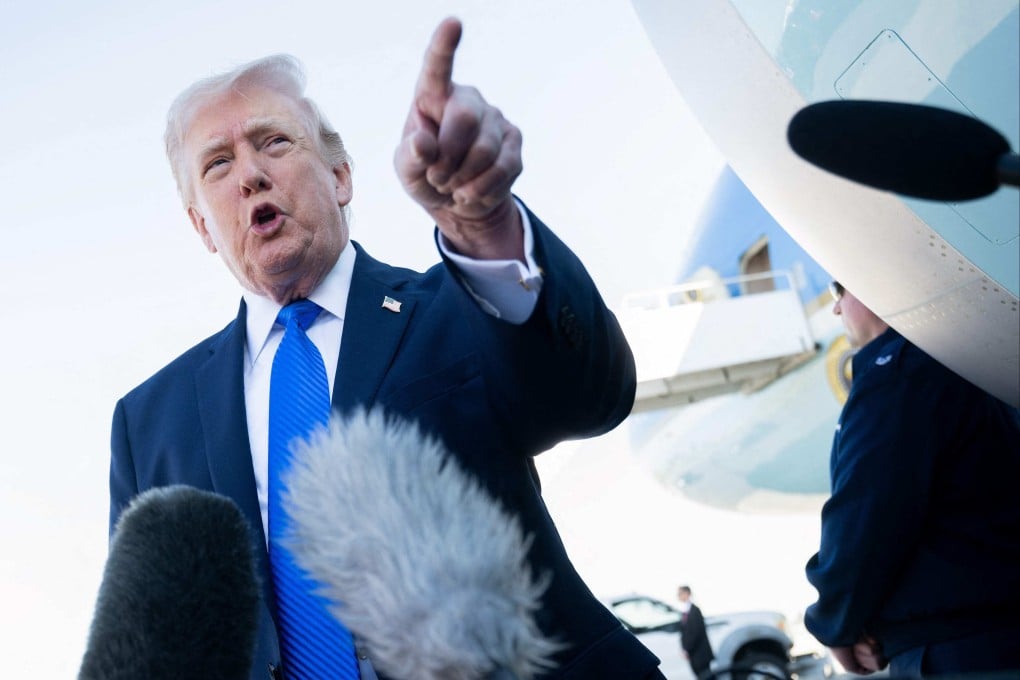 US President Donald Trump speaks to reporters before boarding Air Force One at Palm Beach International Airport in West Palm Beach, Florida, on March 23. Photo: AFP