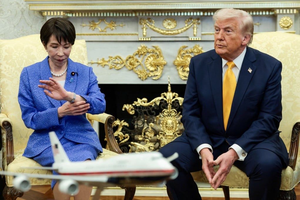 Japanese Prime Minister Sanae Takaichi looks at her watch during a meeting with US President Donald Trump in the Oval Office of the White House in Washington on March 19. Photo: Reuters