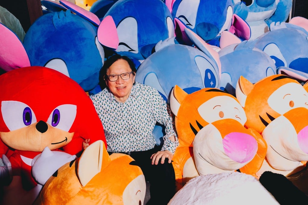 Jeffrey Lee with prizes he won at this year’s AIA Carnival at Central Harbourfront. Photo: Jocelyn Tam