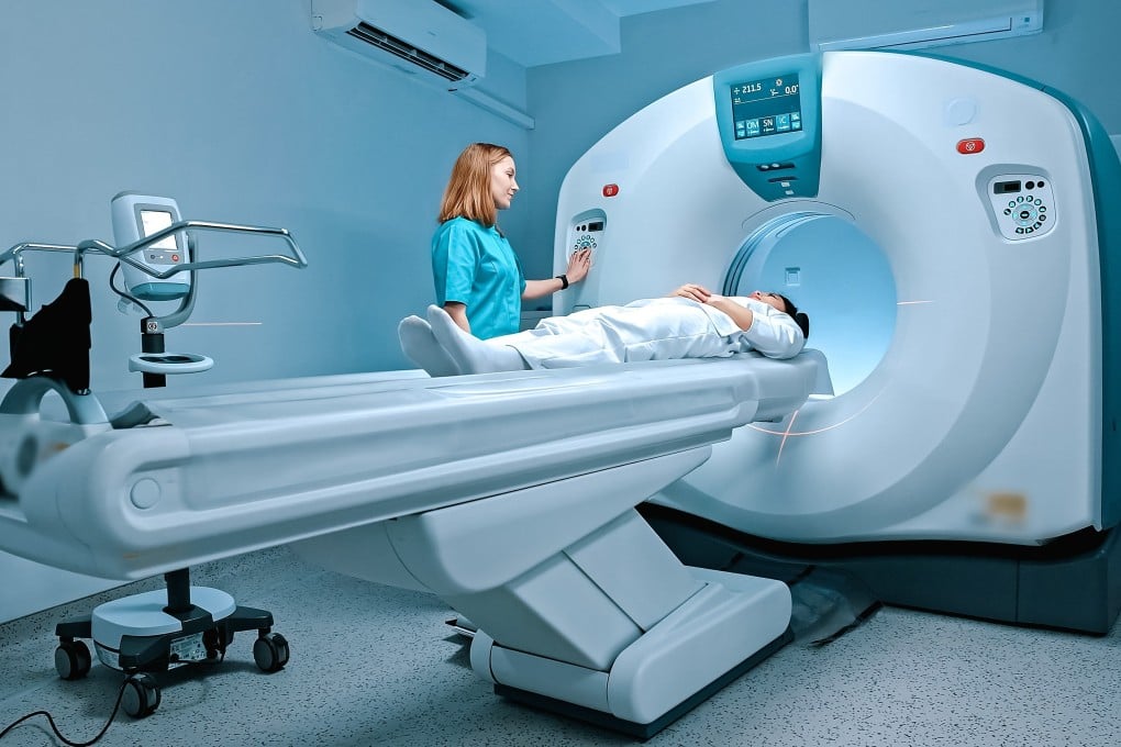 A radiologist gives instructions to a patient about to undergo an MRI scan. Photo: Shutterstock