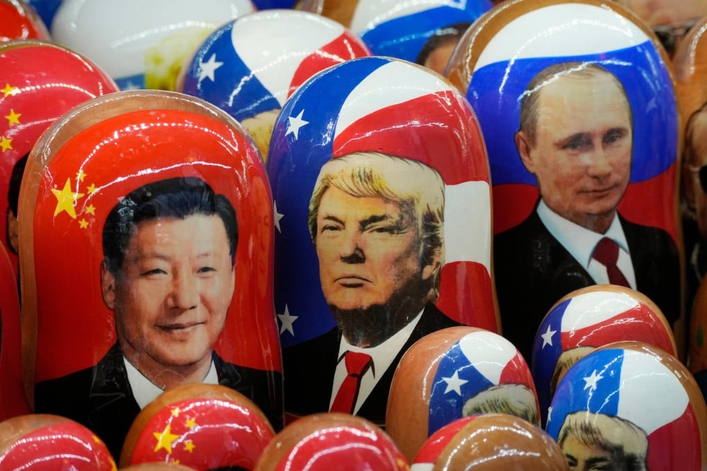 Traditional Russian wooden dolls depict Chinese President Xi Jinping, then US president-elect Donald Trump and Russian President Vladimir Putin at a souvenir shop in St Petersburg, Russia, on November 21, 2024. Photo: AP