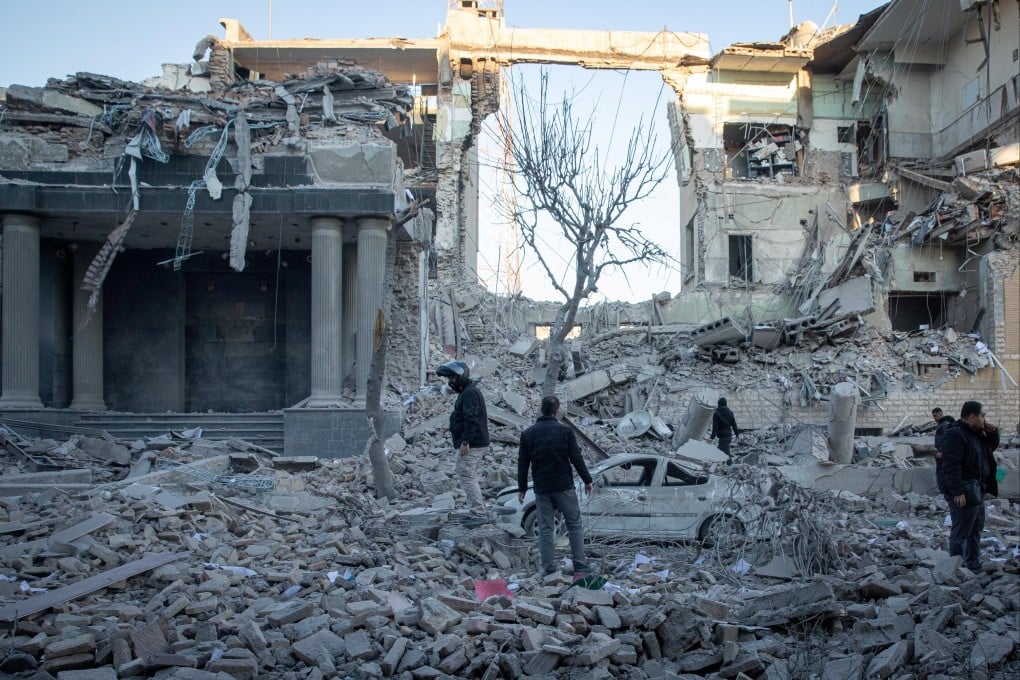 A damaged police station in Tehran following Israeli and US strikes on March 3. Global conflicts are hampering climate goals to reduce or end fossil fuel use. Photo: West Asia News Agency via Reuters