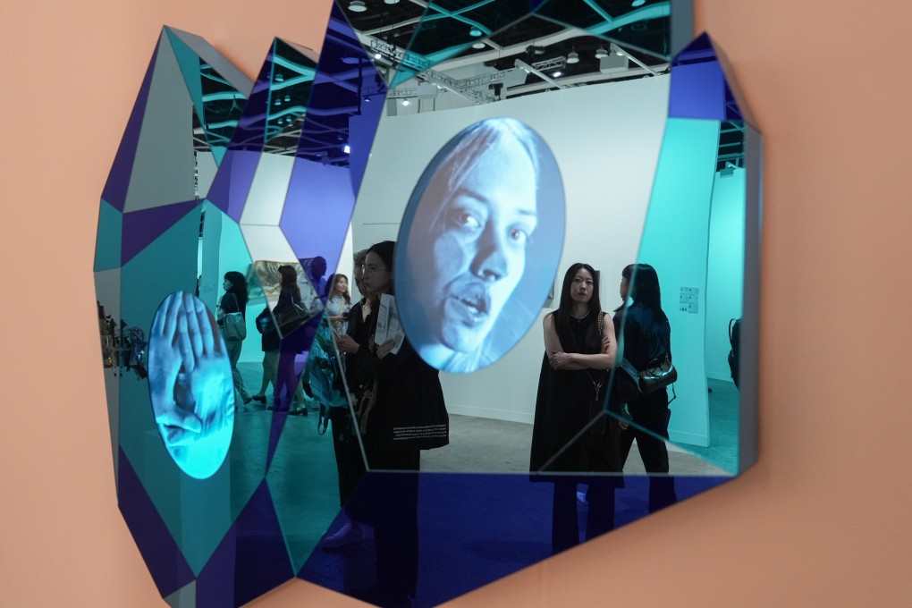 People view Tony Oursler’s work at this year’s Art Basel, at the Hong Kong Convention and Exhibition Centre in Wan Chai, on March 25. Photo: Eugene Lee