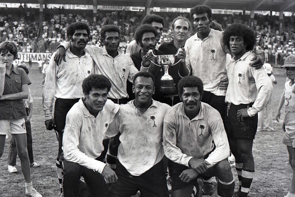 The Fiji team posing with their champions trophy at the Hong Kong Football Club in 1977. Photo: SCMP