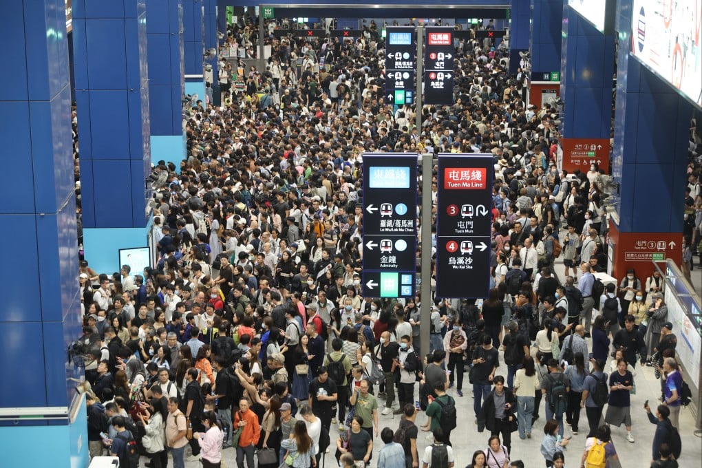 MTR passengers wait at Tai Wai station following the suspension of services. Photo: Edmond So