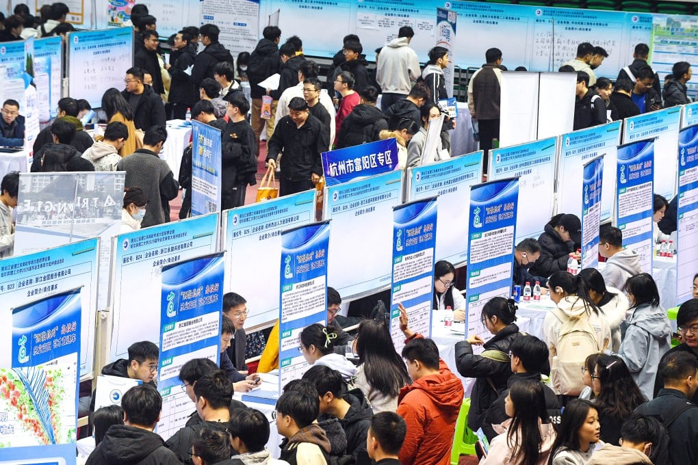 People attend a jobs fair at Harbin University of Science and Technology in the capital of northeastern China’s Heilongjiang province on Tuesday. Photo: Xinhua