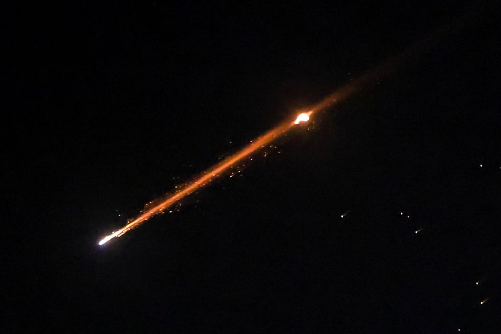 An Iranian missile with cluster munitions flies over Jerusalem on March 20. Photo: Reuters