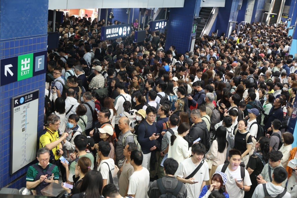 Stranded passengers at Tai Wai station following a suspension of MTR services on Friday. Photo: Edmond So