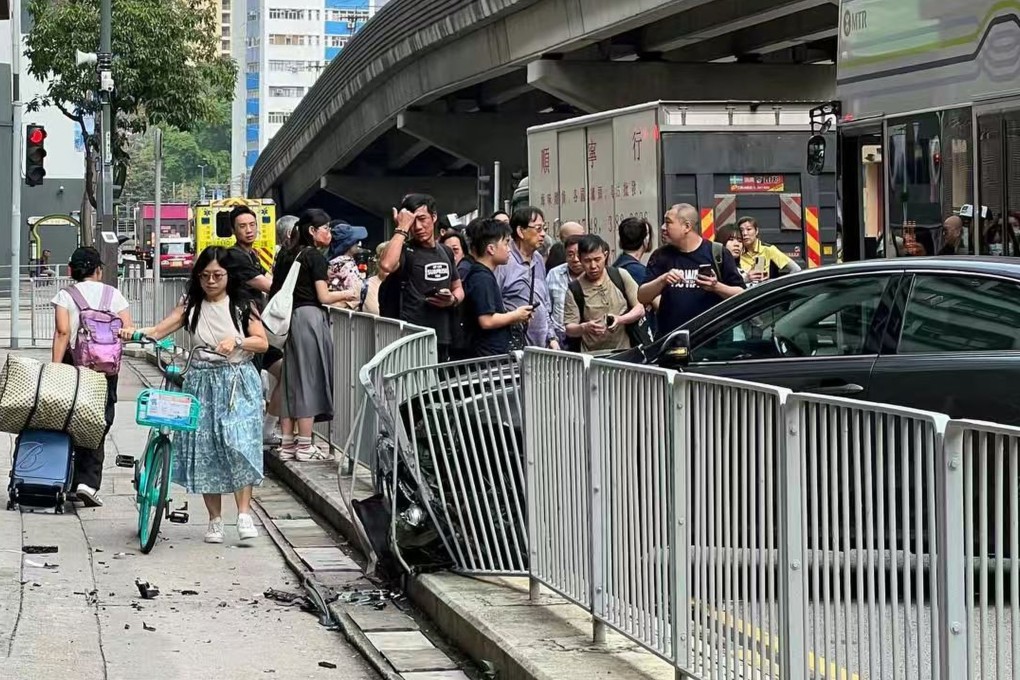 The front of the car wedged into the barricade after crashing in Tuen Mun on Saturday morning. Photo: Handout