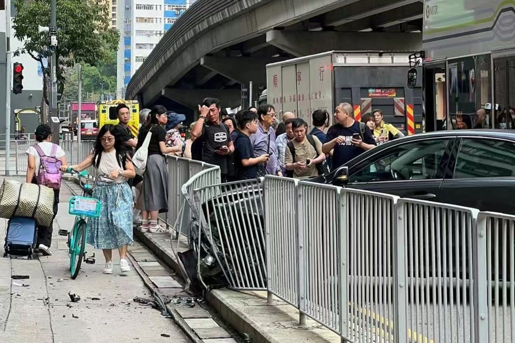The front of the car wedged into the barricade after crashing in Tuen Mun on Saturday morning. Photo: Handout