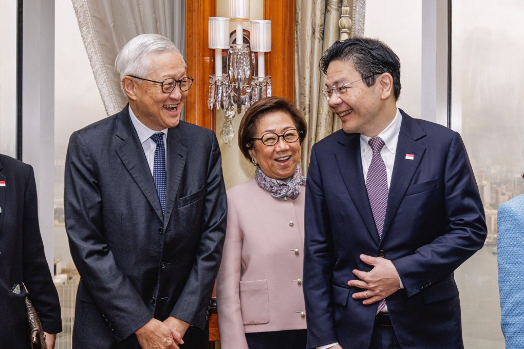 Singapore Prime Minister Lawrence Wong (right) meets former Hong Kong Chief Justice Andrew Li (left) and ex-chairwoman of Hong Kong Exchanges and Clearing Laura Cha. Photo: Facebook/Lawrence Wong