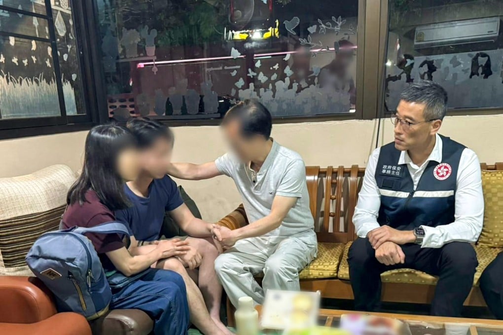 The man is reunited with his family. Photo: Security Bureau