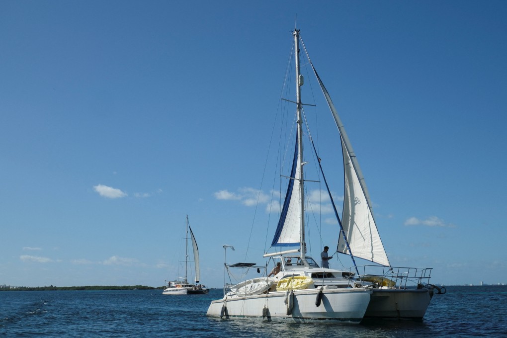 The boats Friendship and Tigger Moth, carrying humanitarian aid for Cuba and crewed by activists, depart from Mexico’s Isla Mujeres on March 21. Photo: Reuters
