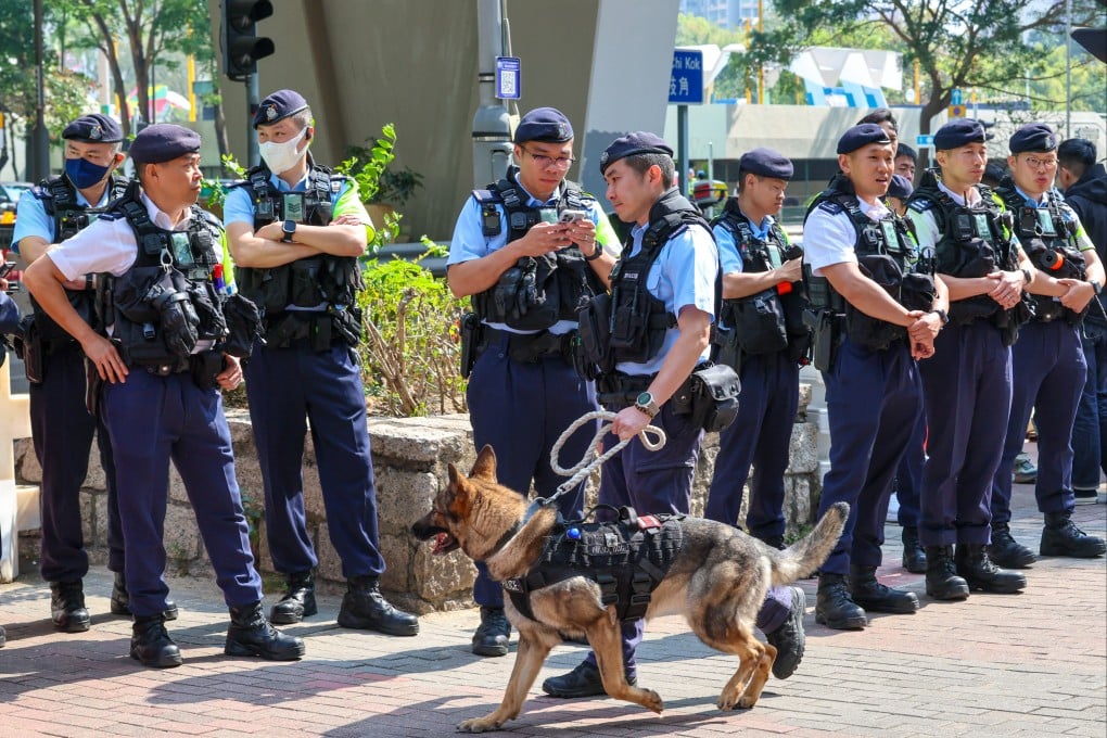 Police officers stand guard outside the Court of Appeal on February 23 as it delivers its verdict on 12 appeals related to the unofficial primary election held in Hong Kong in July 2020. Photo: Dickson Lee