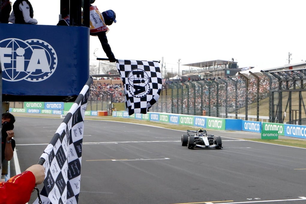 Kimi Antonelli of Italy drives past the chequered flag to win the Formula 1 Japanese Grand Prix at the Suzuka International Racing Course on Sunday. Photo: EPA